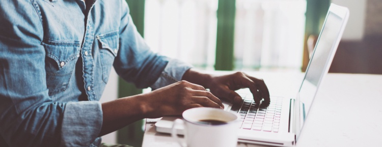 A man working from home on a laptop