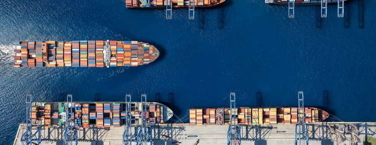 An aerial view of a cargo ship harbour.