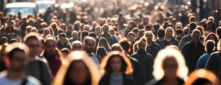 A crowd of people walking.
